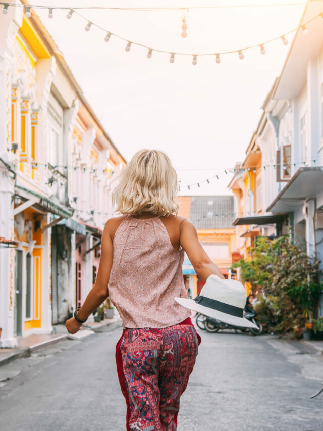 Stories Boho girl walking on the city street
